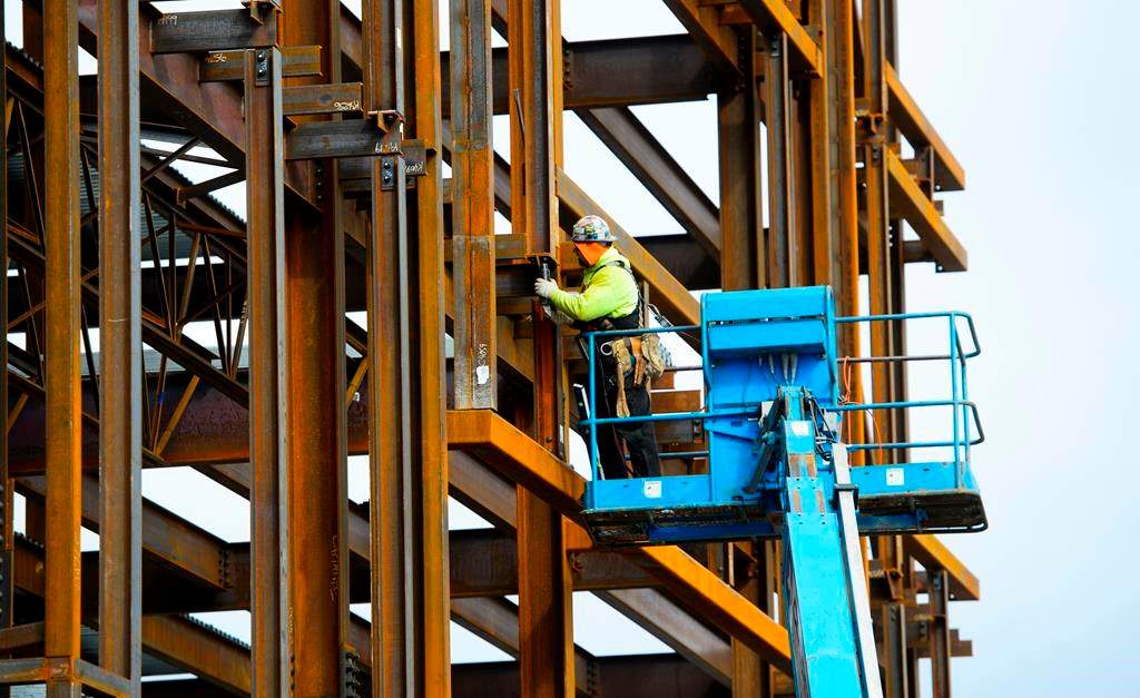 Canada lost 24,200 jobs last month and its unemployment rate moved up to 5.7 per cent to give the economy its weakest three-month stretch of job creation since early 2018. A steel worker builds a structure in Ottawa on Monday, March 5, 2018. Even with the July decline, compared to a year earlier, the numbers show Canada added a healthy dose of 353,000 new positions almost all of which were full time. THE CANADIAN PRESS/Sean Kilpatrick.