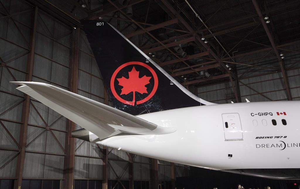 The tail of the newly revealed Air Canada Boeing 787-8 Dreamliner aircraft is seen at a hangar at the Toronto Pearson International Airport in Mississauga, Ont., Thursday, February 9, 2017.