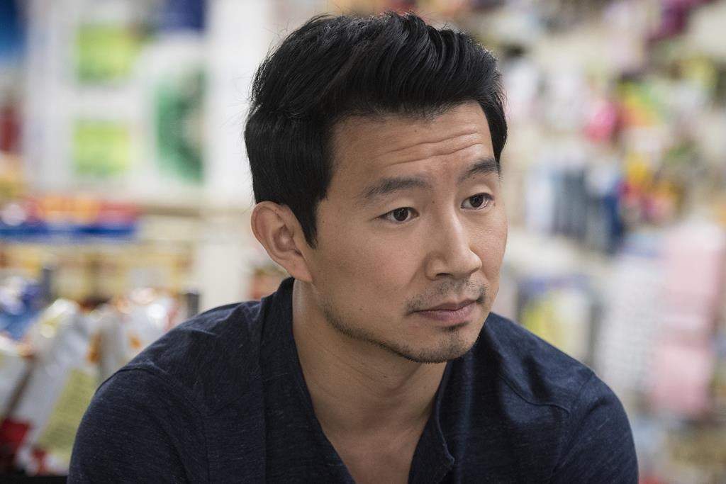 Actor Simu Liu poses for a photograph on set during an interview in Toronto on July 24, 2019.Less than a month after landing the role of Marvel's first big screen Asian-American superhero, Chinese-Canadian actor Simu Liu is adding another major milestone to his resume: a book. HarperCollins says it plans to publish a memoir from the writer/actor/director, who is known for his role on the CBC-TV comedy series "Kim's Convenience.