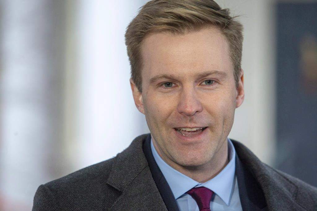 New Brunswick Liberal Leader Brian Gallant answers questions from the media in Fredericton on Nov. 2, 2018. Former New Brunswick premier Brian Gallant has a new job with Toronto's Ryerson University.Gallant announced on Facebook that he has accepted the role of special advisor to the to the president of the university on innovation, cybersecurity, and law.