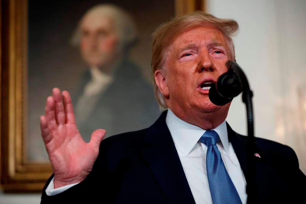 U.S. President Donald Trump speaks about the mass shootings in El Paso, Texas, and Dayton, Ohio, in the Diplomatic Reception Room of the White House, Monday, Aug. 5, 2019, in Washington. (AP Photo/Evan Vucci)