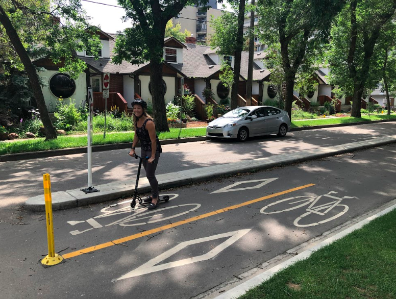 An e-scooter being driven in a bike lane in Edmonton. 
