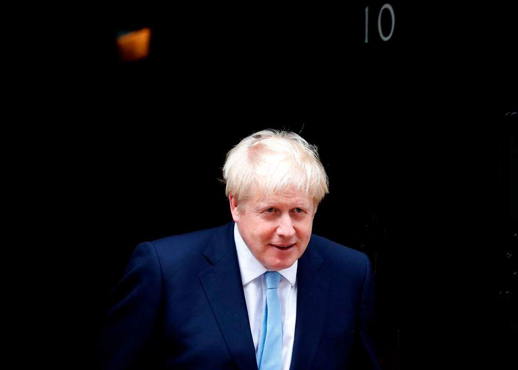 Britain’s Prime Minister Boris Johnson leaves 10 Downing St. in London, Wednesday, Aug. 7, 2019. (AP Photo/Frank Augstein)