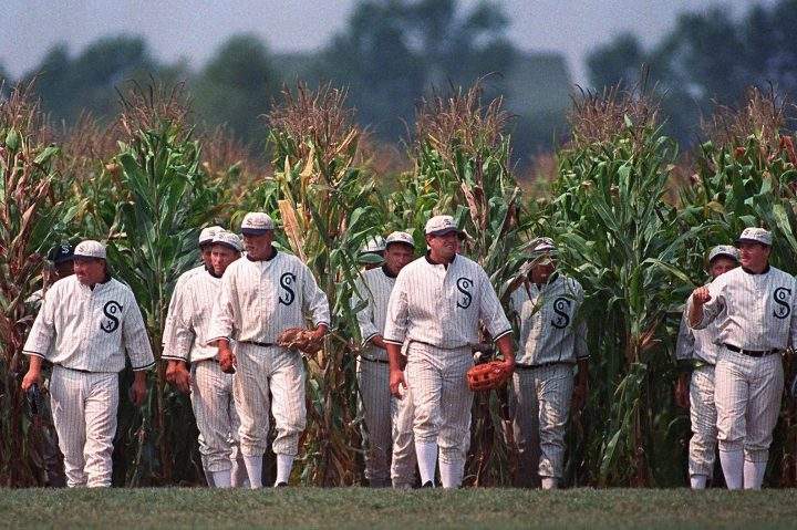 In this July 22, 1997, file photo, people portraying ghost players emerge from a cornfield as they reenact a scene from the movie "Field of Dreams" at the movie site in Dyersville, Iowa. 