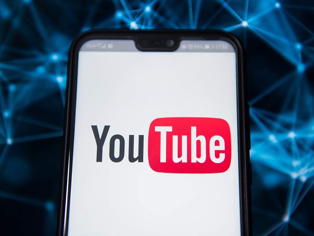 In this photo illustration, the Youtube logo is seen displayed on an Android mobile phone.