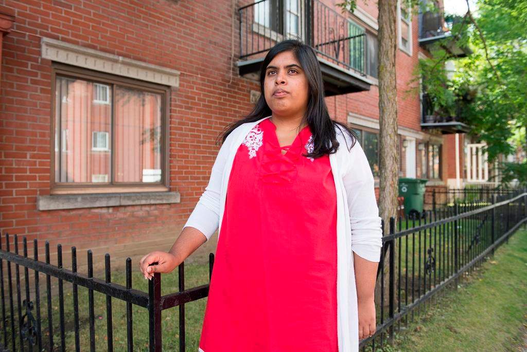 Samiha Hassain poses on a street in the Montreal neighbourhood of Parc-Extension, Saturday, August 31, 2019. Residents of Montreal's Park Extension area say evictions are on the rise amid gentrification in the province's poorest neighbourhood.