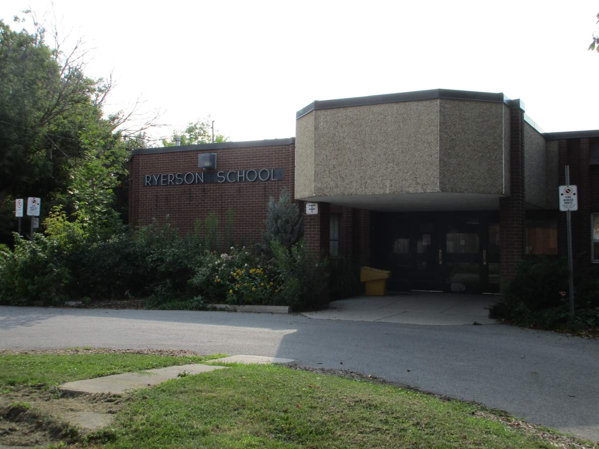 A middle school principal is facing two charges related to a reported sexual assault from 2017.