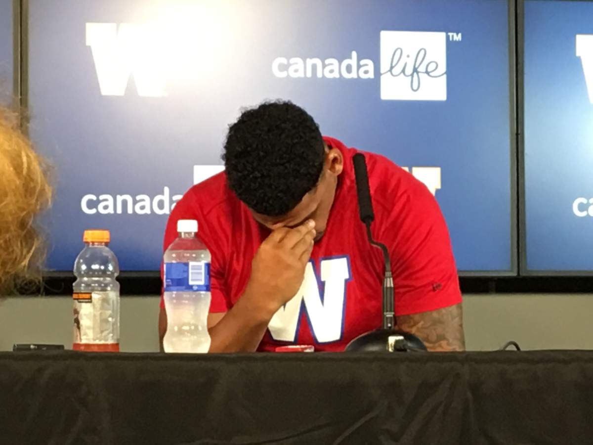 Winnipeg Blue Bombers Running back, Andrew Harris (33), addresses the media following a two game suspension by the CFL. Harris had tested postive for a banned substance in back July.