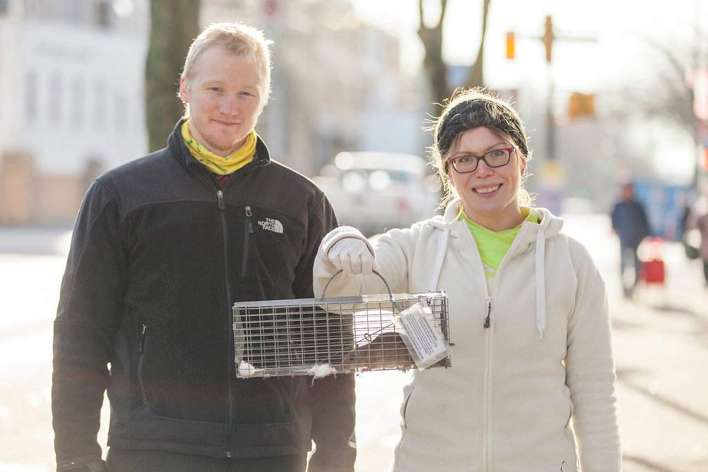 Vancouver Rat Project researchers Michael Lee and Kaylee Byers pose with one of their research subjects.