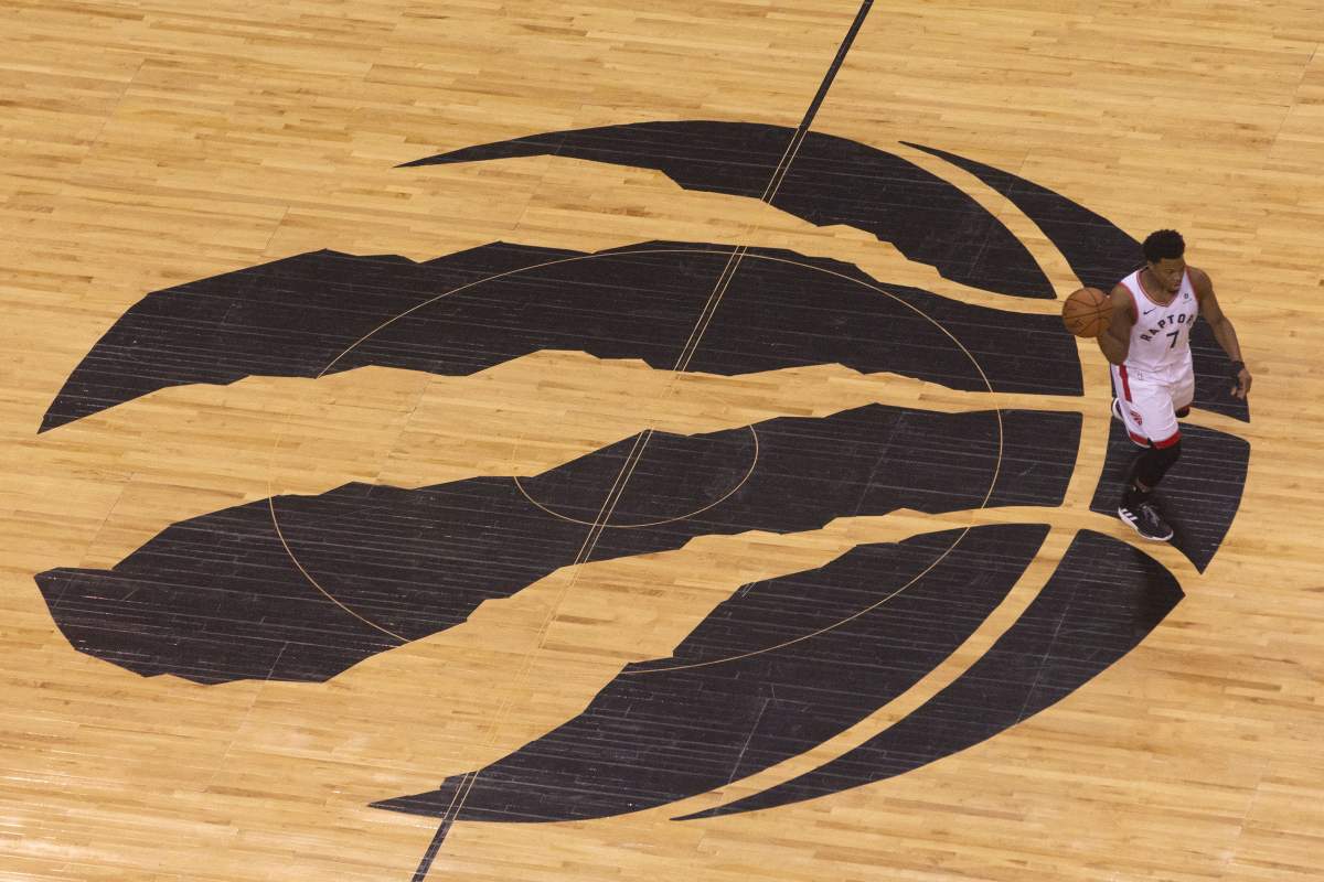 Toronto Raptors guard Kyle Lowry (7) dribbles the ball down court during first half NBA Eastern Conference finals action against the Milwaukee Bucks, in Toronto on Saturday, May 25, 2019.