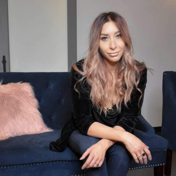 Marissa King, owner of the Maven hair studio in Urbandale, Iowa, is shown in this photo from Oct. 3, 2018.