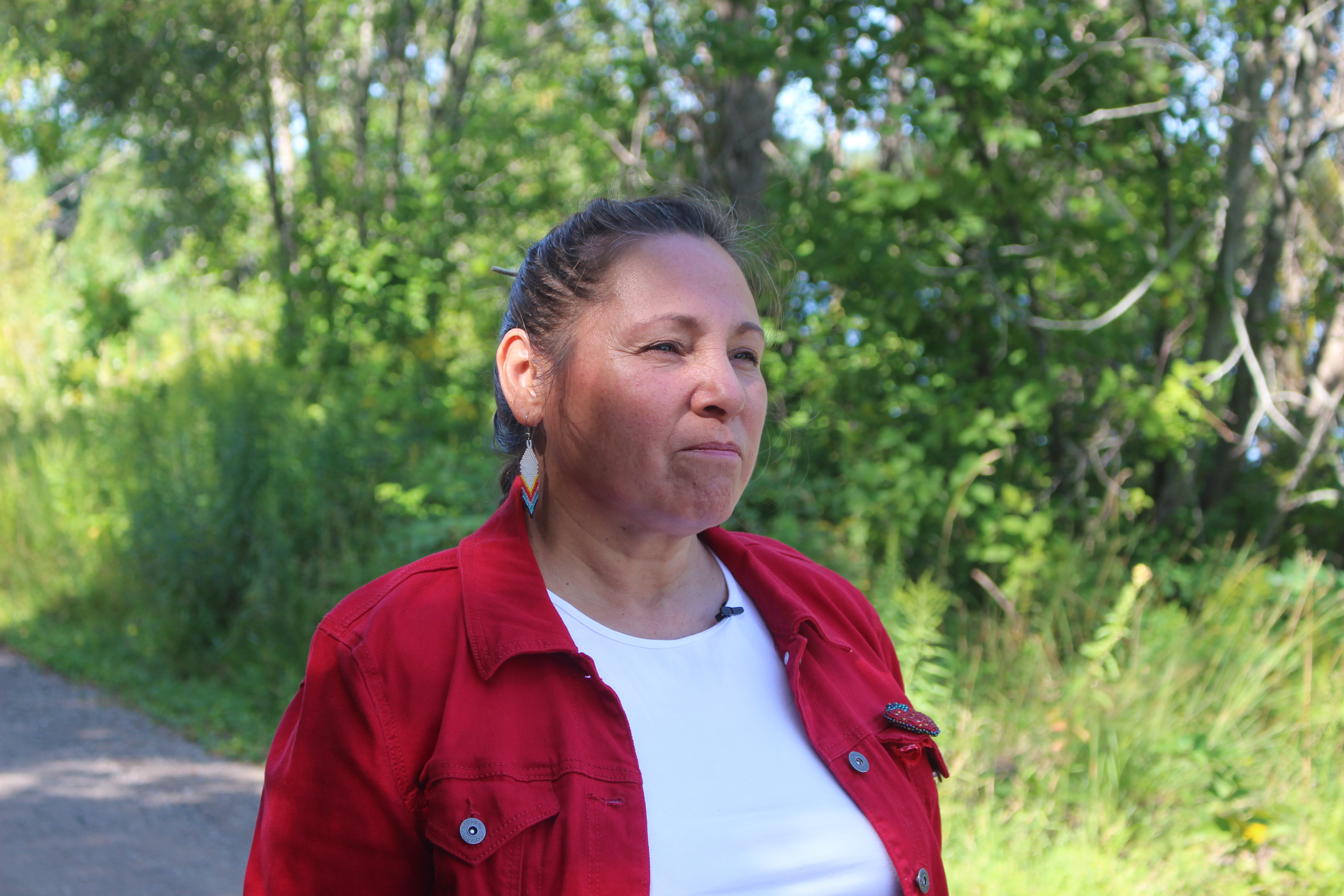 “I think families have to be always ready to catch their loved ones in whatever way they can,” says Meggie Cywink, pictured here outside her family home in Whitefish River First Nation on Aug. 20, 2019.