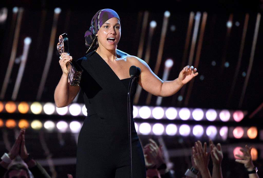 In this March 14, 2019 file photo, Alicia Keys accepts the music innovator award at the iHeartRadio Music Awards at the Microsoft Theater in Los Angeles, Calif.