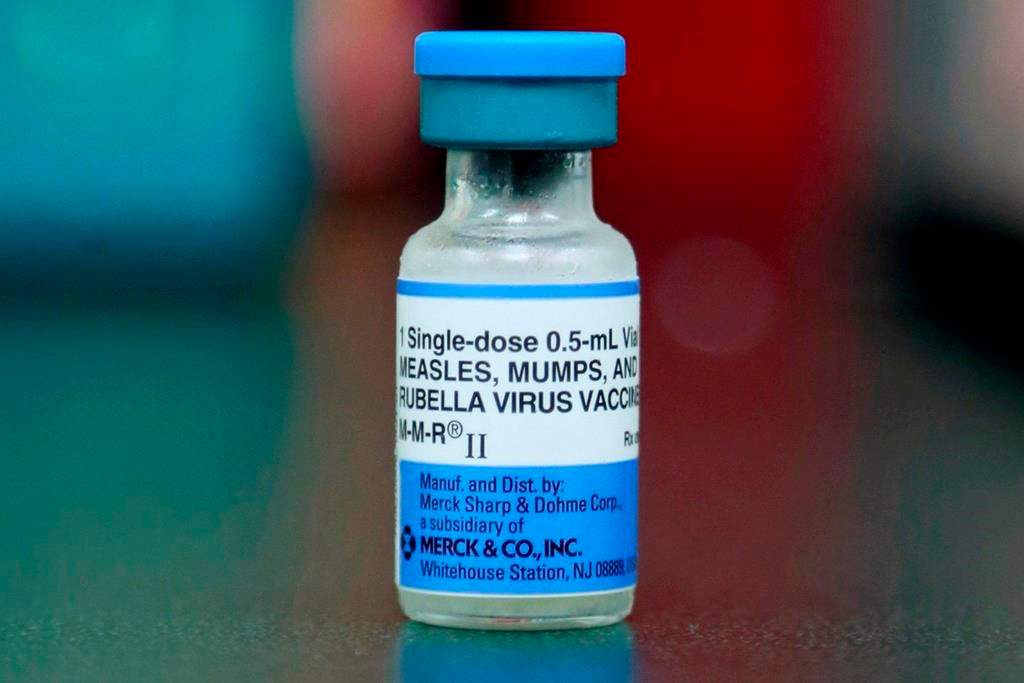 A vial of a measles, mumps and rubella vaccine.