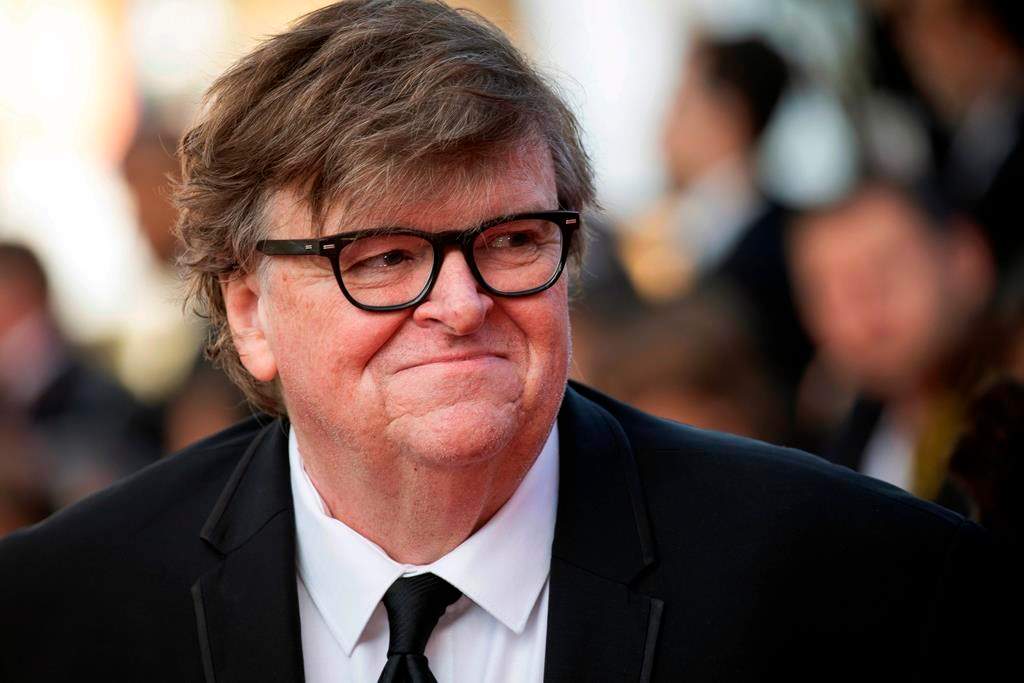 This May 25, 2019, file photo shows Michael Moore at the awards ceremony of the 72nd international Cannes Film Festival in southern France.