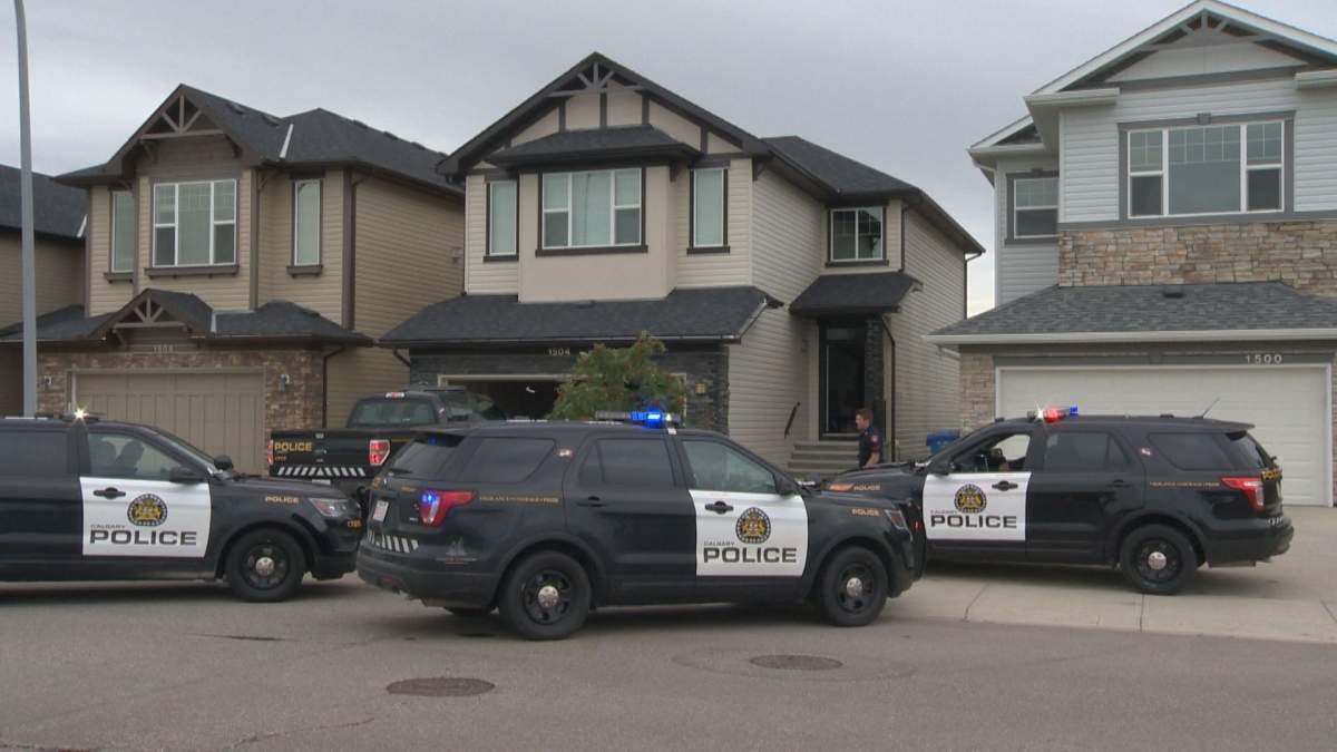 Calgary police on the scene of a break and enter where an officer was bitten by a police dog on Friday, Aug. 16. 