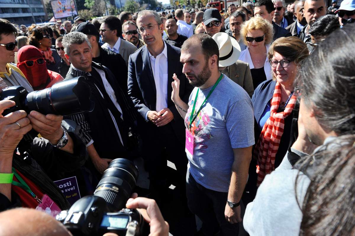 Speaking to media at Pride in Belgrade.