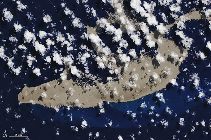 A pumice raft created by an underwater volcano is shown in the Pacific Ocean in this satellite photo taken Aug. 13, 2019.