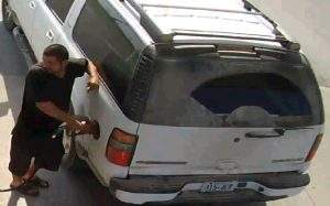Photo of a gas-theft suspect driving vehicle with stolen licence plate