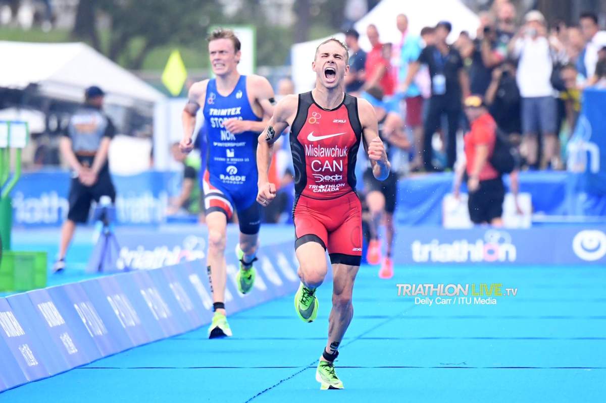 Oak Bluff, Manitoba’s Tyler Mislwachuk out sprints Casper Stornes of Norway at the finish line of a Triathlon World Series Olympic Test Event in Tokyo, Japan. Photo Credit: Delly Carr/ITU Media