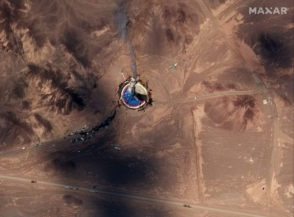 This satellite image from Maxar Technologies shows a fire at a rocket launch pad at the Imam Khomeini Space Center in Iran's Semnan province, Thursday, Aug. 29, 2019. Satellite images released Thursday show the smoldering remains of a rocket at a Iran space center that was to conduct a U.S.-criticized satellite launch. 