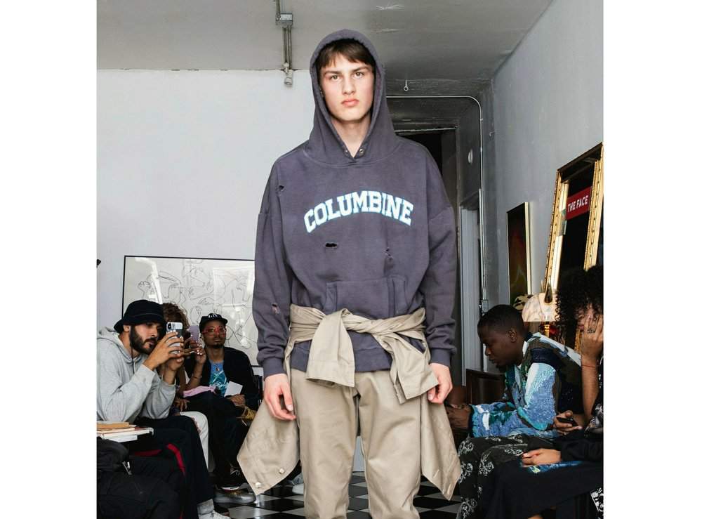 Models at a show for fashion brand Bstroy wear hoodies emblazoned with the names of schools touched by mass shootings at an apartment in the Soho neighborhood of Manhattan in New York. (Bstroy via AP)