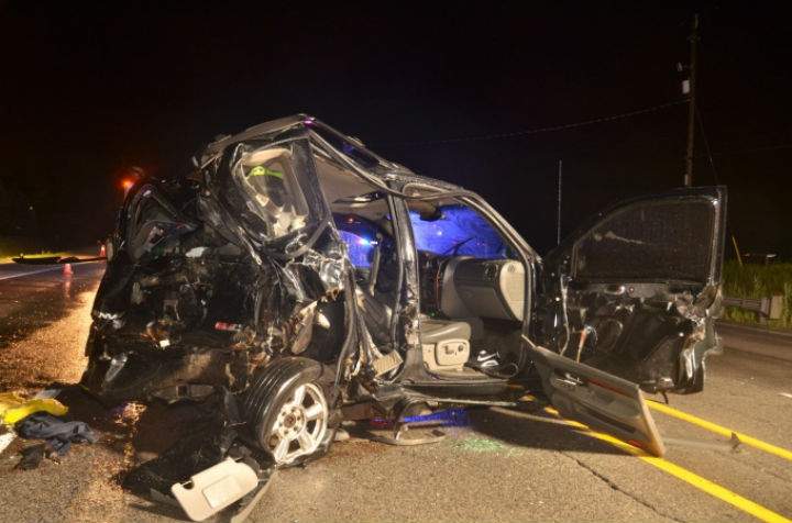 Rear end damage to the GMC Envoy SUV following a police pursuit in July 2018.