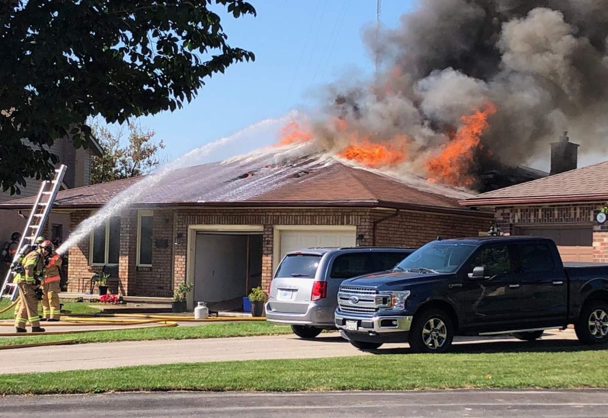 Fire crews battle a house fire at 30 Parkside Cres. on Sept. 30, 2019. The blaze left $400,000 in damage.