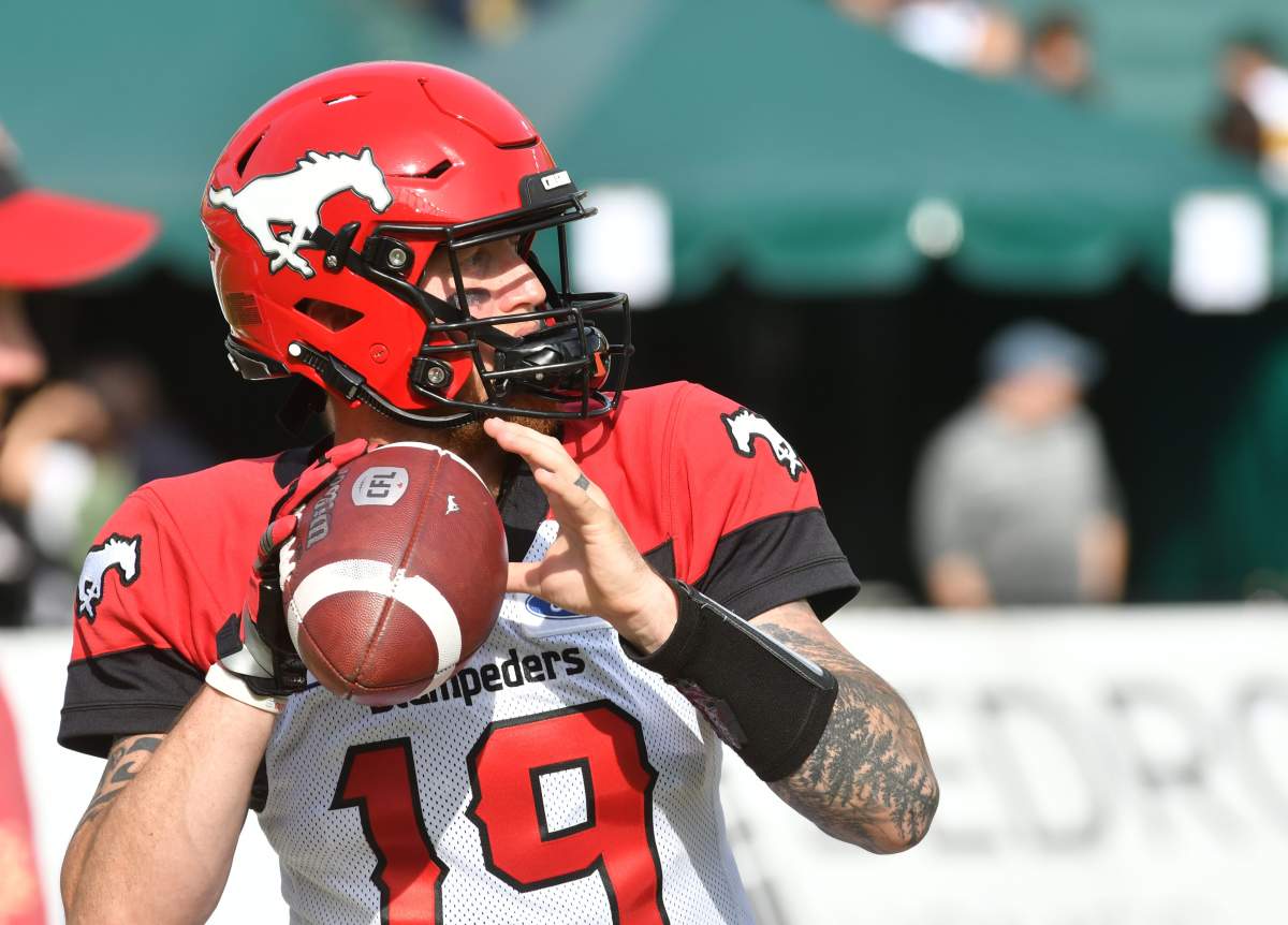 Calgary Stampeders player #19 (QB) Bo Levi Mitchell gets ready to throw the ball as the Edmonton Eskimos take on the Calgary Stampeders during the pre-game warm-up before the first half half of CFL game action at the Brick Field located at Commonwealth stadium in Edmonton Saturday, September 07, 2019.