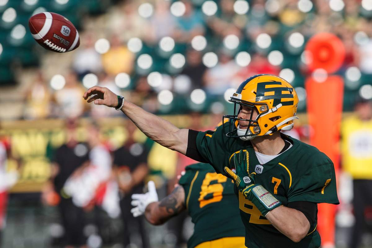 Edmonton Eskimos quarterback Trevor Harris (7) makes the throw against the Calgary Stampeders during first half CFL action in Edmonton, Alta., on Saturday September 7, 2019. 
