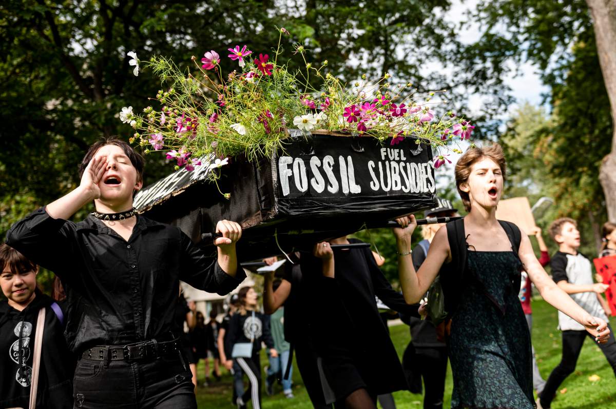 Young people gather at a climate change protest in Toronto on Friday, Sept. 27, 2019. THE CANADIAN PRESS/Christopher Katsarov
