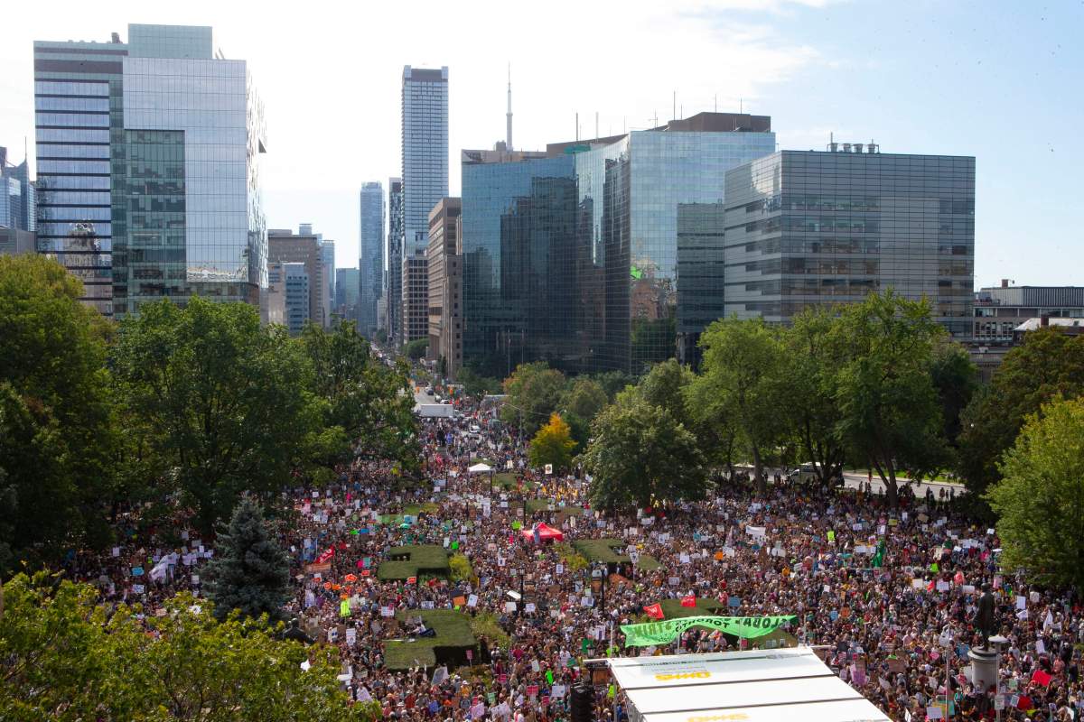 Protesters gather outside the Ontario legislature for the climate strike in Toronto on Friday, Sept. 27, 2019. THE CANADIAN PRESS/Chris Young