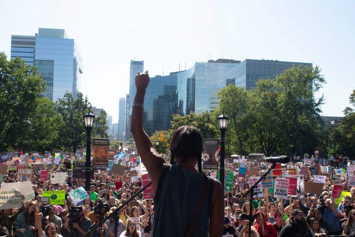 First Nations activist Caroline Crawley addresses the crowd outside the Ontario legislature for the climate strike in Toronto on Friday, Sept. 27, 2019. THE CANADIAN PRESS/Chris Young