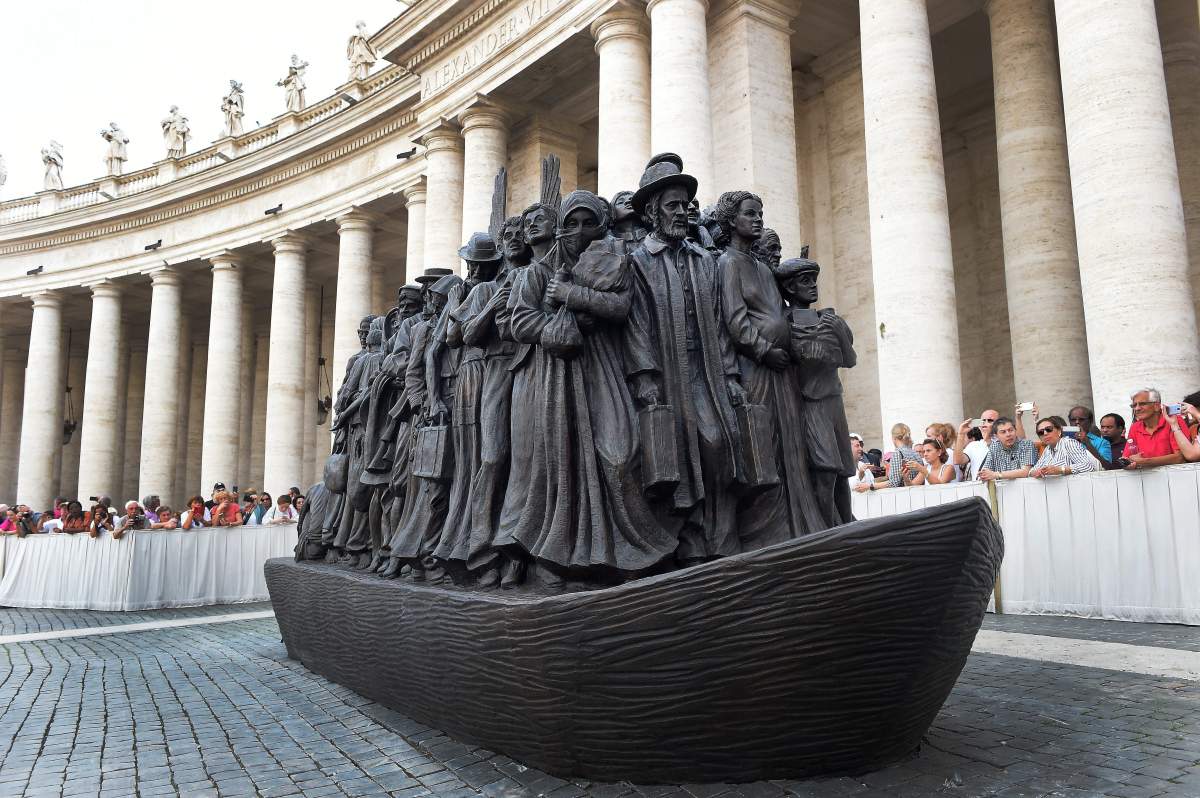 Pope Francis unveils a sculpture commemorating migrants and refugees entitled “Angels Unawares” by Canadian artist Timothy Schmaltz on September 29, 2019 at St. Peter’s Square.