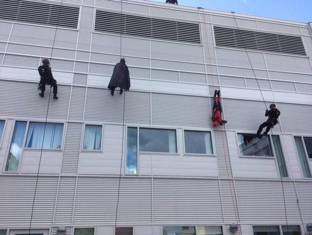 Quebec City police officers scale down the building to visit immunosuppressed children who couldn't leave their hospital rooms on Thursday, Sept. 5, 2019.