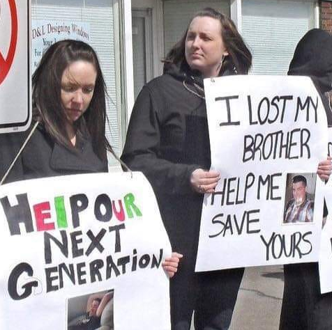 Amy Graves holds a rally against street proscription drugs nine days after the death of her brother Joshua.