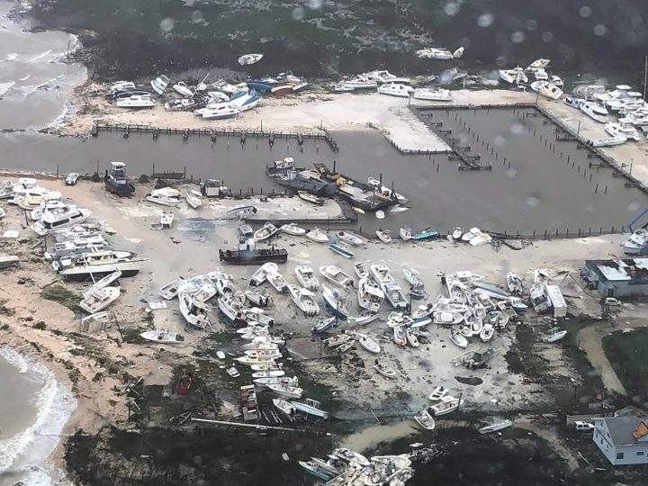In this Monday, Sept. 2, 2019 photo released by the U.S. Coast Guard Station Clearwater, boats litter the area around marina in the Bahamas after they were tossed around by hurricane Dorian.