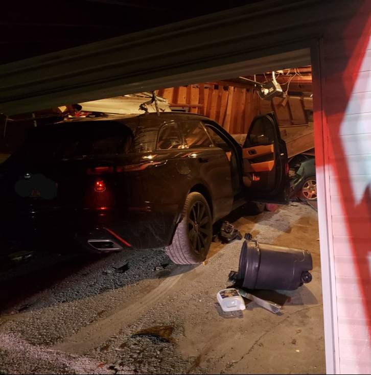 An SUV crashed into an attached garage at a home on Dale Road in Hamilton Township early Sunday.