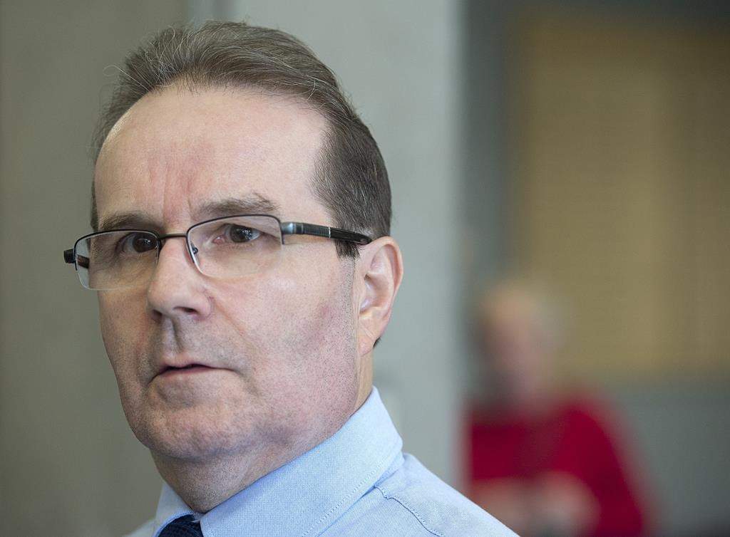 Glen Assoun, the Nova Scotia man who spent almost 17 years in prison for a crime he didn't commit, stands outside Supreme Court in Halifax on Friday, July 12, 2019.