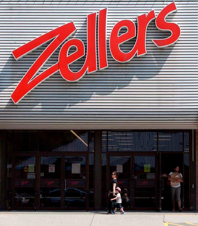 Customers leave a Zellers store in Lynn Valley in North Vancouver, B.C., Thursday, July, 26, 2012.