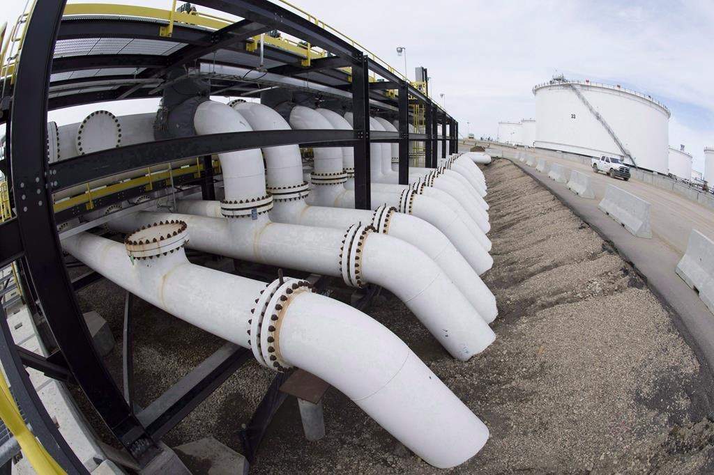 Pipes are seen at the Kinder Morgan Trans Mountain facility in Edmonton, Alta., Thursday, April 6, 2017. THE CANADIAN PRESS/Jonathan Hayward