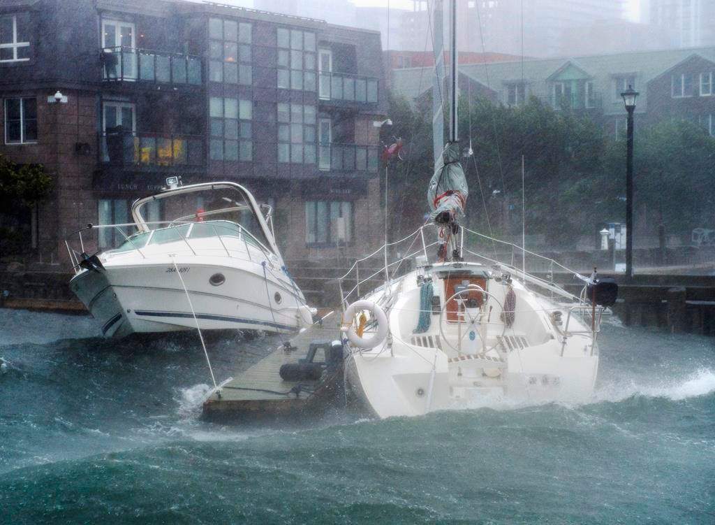 Pleasure boats take a beating along the waterfront in Halifax as hurricane Dorian approaches on Saturday, Sept. 7, 2019.