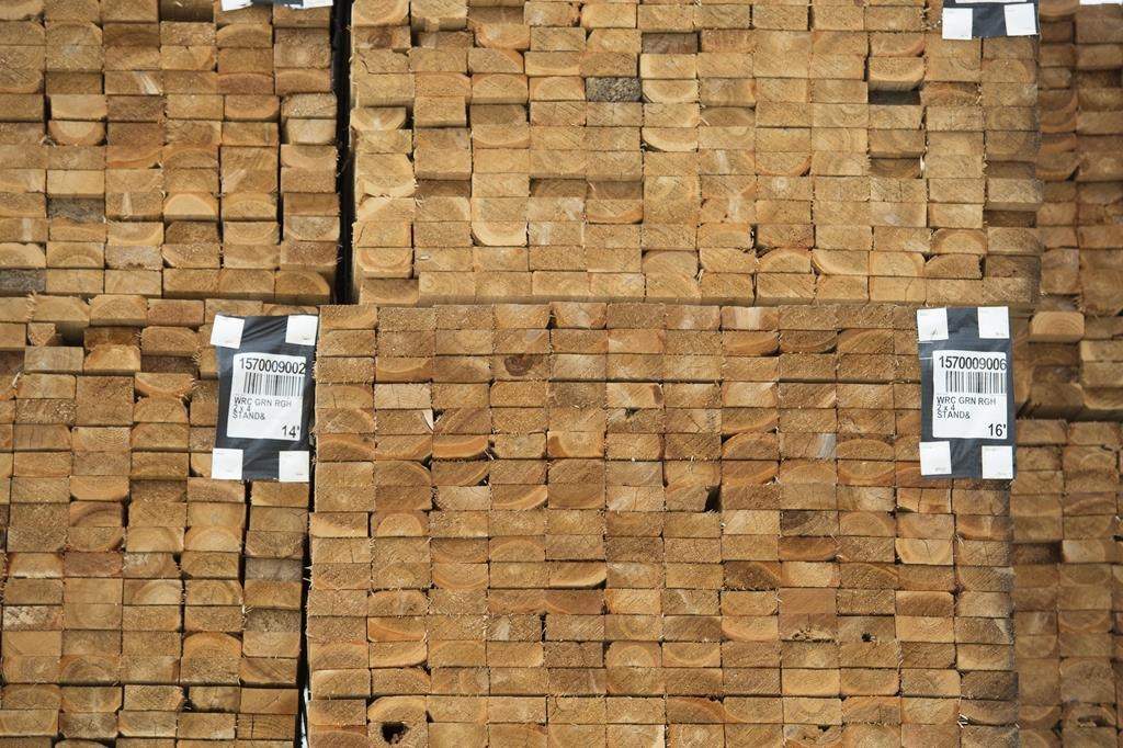 Fresh cut lumber is pictured stacked at a mill along the Stave River in Maple Ridge, B.C. Thursday, April 25, 2019. THE CANADIAN PRESS/Jonathan Hayward.