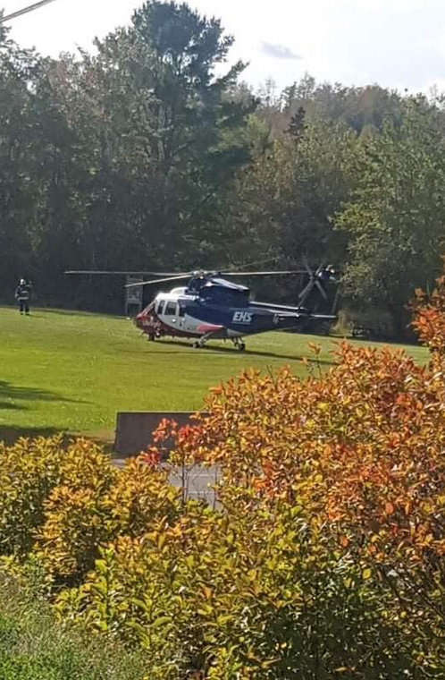 Police say the woman was flown to hospital with life-threatening injuries. 