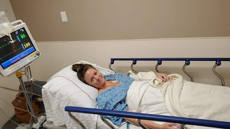 A slightly embarrassed Jenna Evans is shown after her engagement ring was removed from her stomach at a hospital in San Diego, Calif., on Sept. 11, 2019.