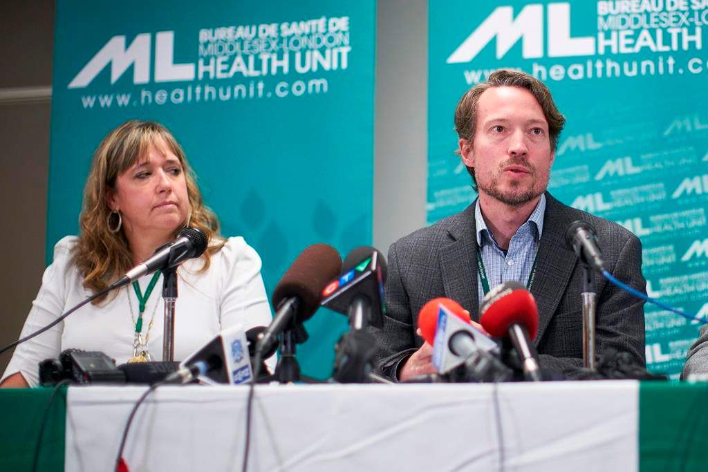 Dr. Chris Mackie, Medical Officer and CEO of Health for the Middlesex-London Health Unit speaks during a press conference in London, Ont., Wednesday, September 18, 2019 as Linda Stobo, manager, Chronic Disease and Tobacco Control at the unit looks on.