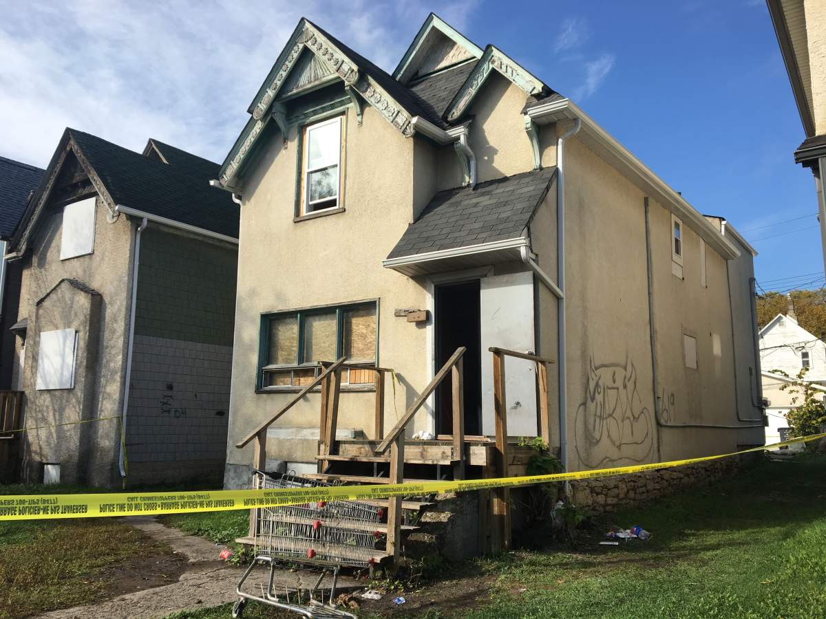 Winnipeg Police investigating at the scene of a homicide on Balmoral Street, Sunday morning.