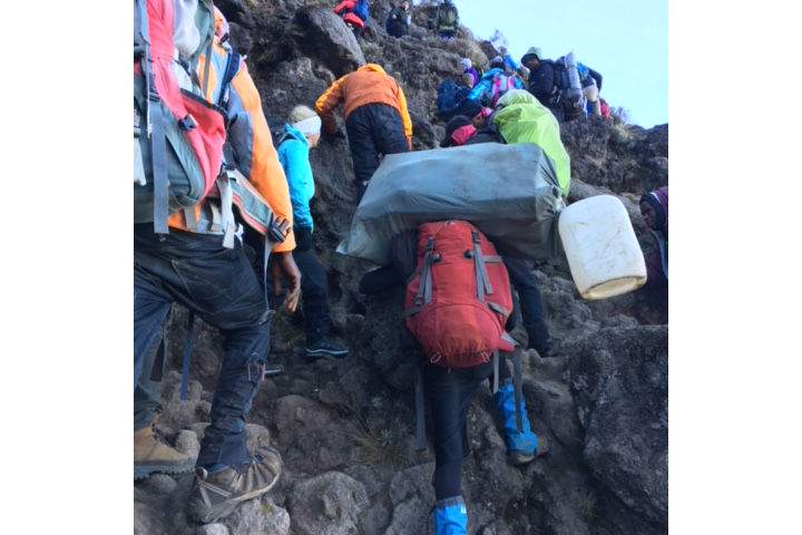 Climbing Mount Kilimanjaro.