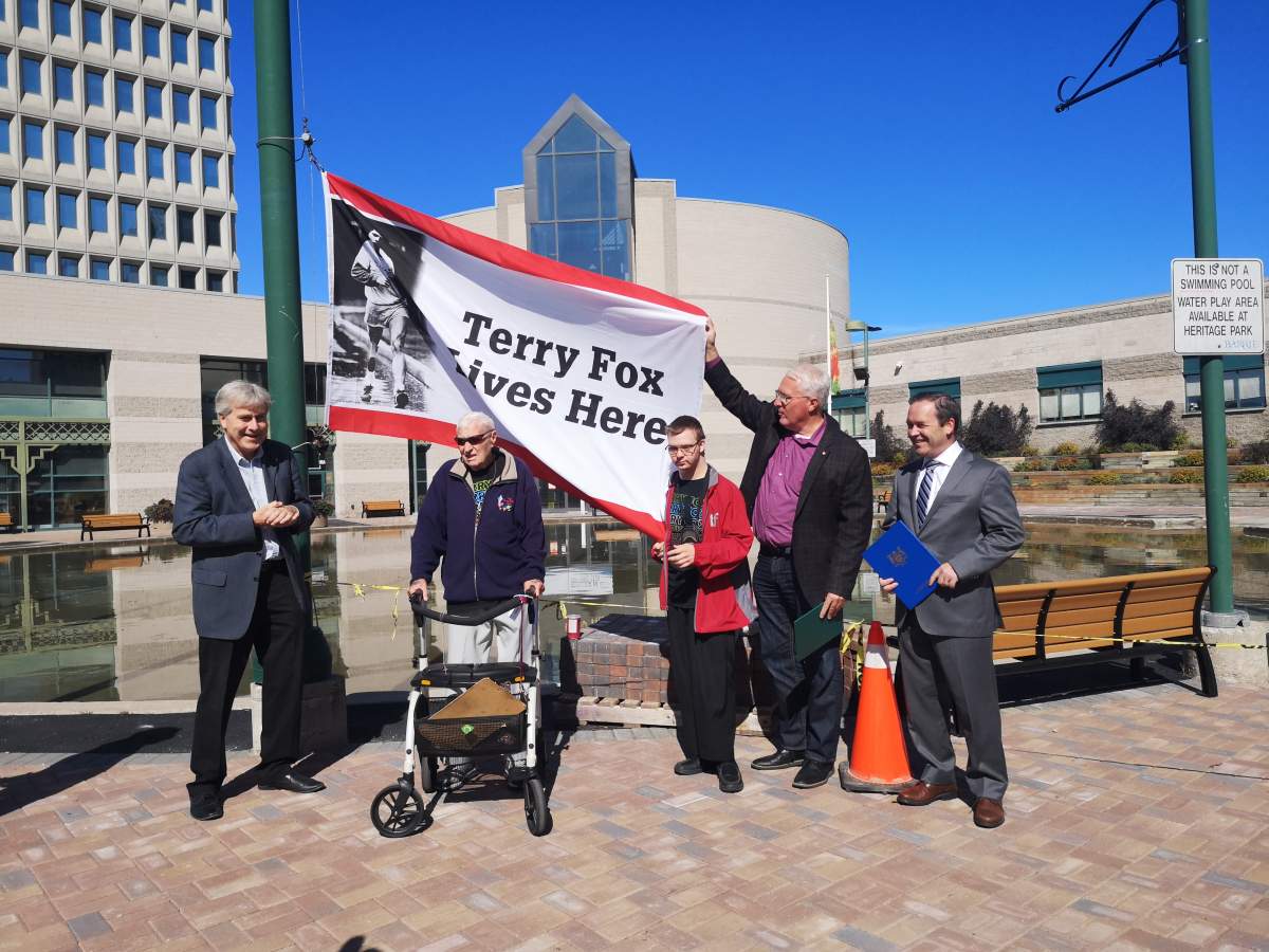 Will Dwyer at the Terry Fox flag raising in front of Barrie City Hall on Monday.