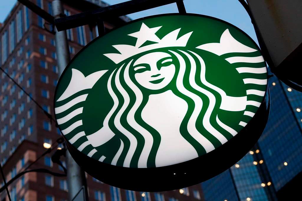 FILE - This June 26, 2019 file photo shows a Starbucks sign outside a Starbucks coffee shop in downtown Pittsburgh.